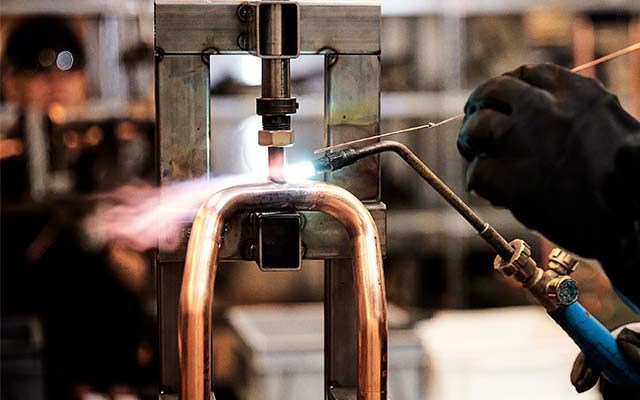 Pipe soldering in production